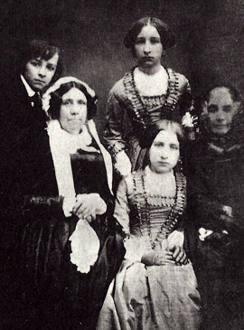 Cosima, ihr Vater Franz Liszt (am Klavier) und Hans von Bülow
